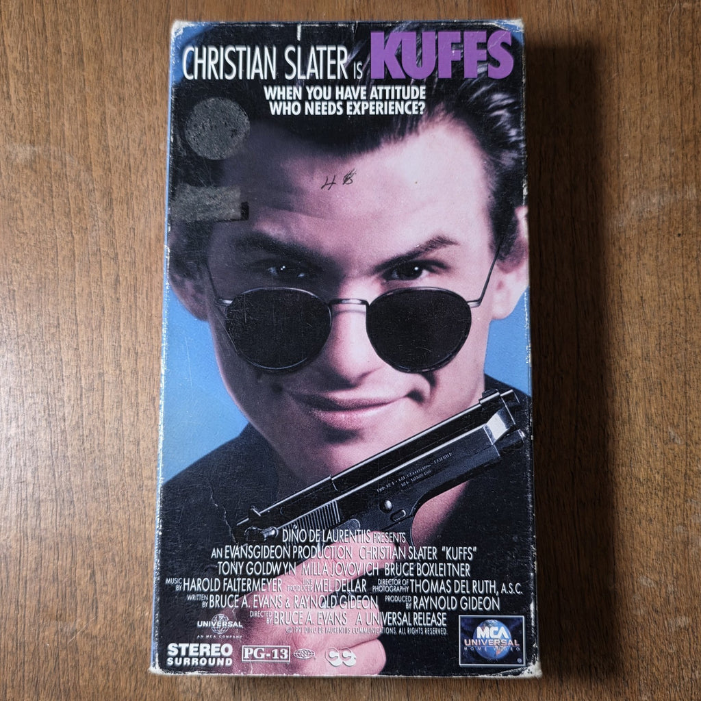 Kuffs 1992 VHS Bruce A. Evans Action Comedy Christian Slater Milla Jovovich